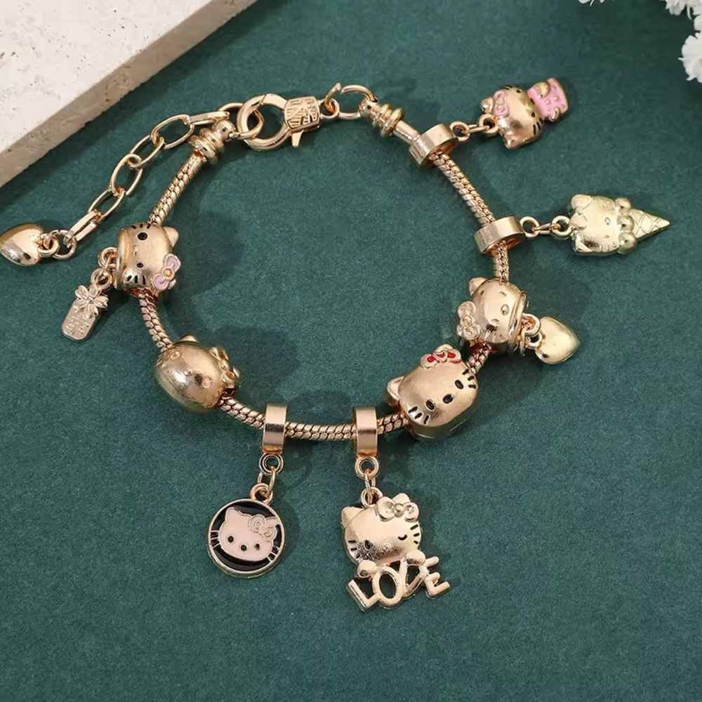 Hello Kitty Charming Gold Bracelet with Heart and Character Charms